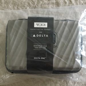 TUMI hard case travel bag